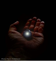 Ishtalinga reflecting a point of light in the palm